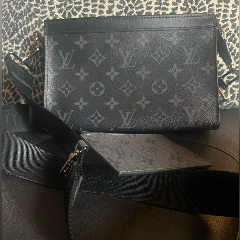 Louis Vuitton Gaston Wearable wallet with detachable card holder.